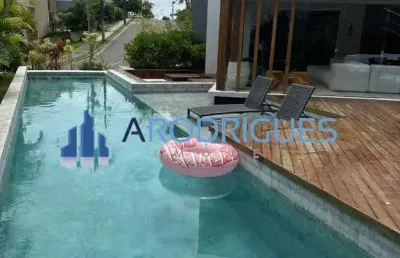 Venda de casa em condomínio de luxo em alphaville ii, salvador-ba: 3 quartos, 3 suítes, 2 salas, 4 vagas, 600m².