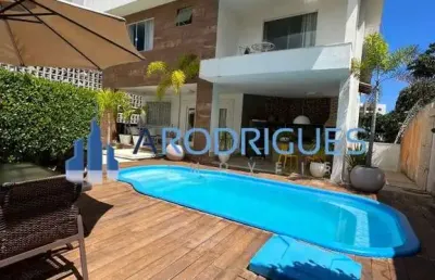 Casa de luxo à venda no alphaville i: 6 quartos, 5 suítes, 4 salas, 4 banheiros, 5 vagas de garagem e 610m² de área. jardim e aceita permuta!