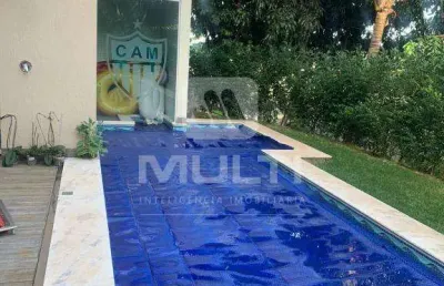 Casa em condomínio fechado com 4 quartos para alugar no Jardins Barcelona, Uberlândia 