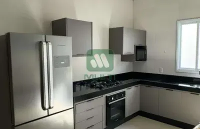 Casa em condomínio fechado com 3 quartos para alugar no Jardim Sul, Uberlândia 