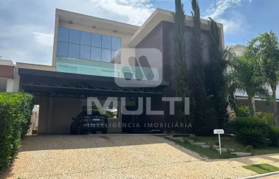 Casa em condomínio fechado com 6 quartos para alugar no Jardins Gênova, Uberlândia 