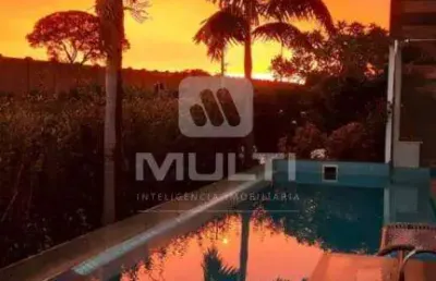 Casa em condomínio fechado com 4 quartos para alugar no Jardins Gênova, Uberlândia 