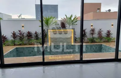 Casa em condomínio fechado com 4 quartos à venda no Jardins Gênova, Uberlândia 