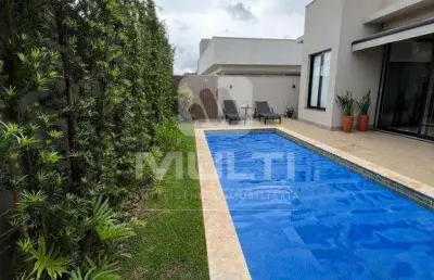 Casa em condomínio fechado com 4 quartos à venda no Buritis, Uberlândia 