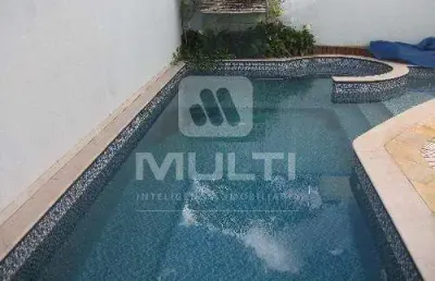 Casa em condomínio fechado com 3 quartos à venda no Santa Mônica, Uberlândia 