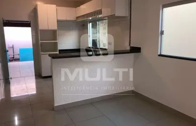 Casa com 3 quartos à venda no Jardim Holanda, Uberlândia 