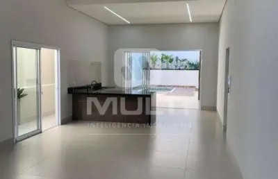 Casa com 3 quartos à venda na Cidade Jardim, Uberlândia 