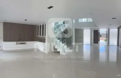 Casa em condomínio fechado com 4 quartos para alugar no Jardim Karaíba, Uberlândia 