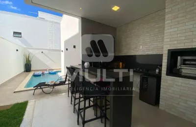 Casa em condomínio fechado com 3 quartos à venda no Nova Uberlândia, Uberlândia 