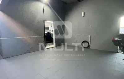 Casa com 3 quartos à venda no Santa Mônica, Uberlândia 