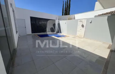 Casa em condomínio fechado com 3 quartos para alugar no Jardins Barcelona, Uberlândia 