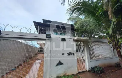 Casa com 5 quartos à venda no Jardim Karaíba, Uberlândia 