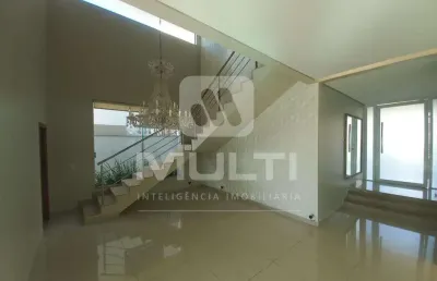 Casa em condomínio fechado com 4 quartos para alugar no Jardins Roma, Uberlândia 