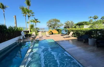 Luxuosa casa em condomínio com 6 quartos e 6 suítes em juquehy, são sebastião-sp: 400m², 3 salas, 6 banheiros e 4 vagas.