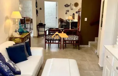Casa  em condomínio à venda em juquehy, são sebastião-sp: 4 quartos, 2 suítes, salas amplas e garagem.