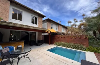 Casa com piscina em condomínio à venda em praia de pauba-são sebastião-sp, com 4 quartos, 4 suítes e 156m² de área, no bairro paúba. aproveite!