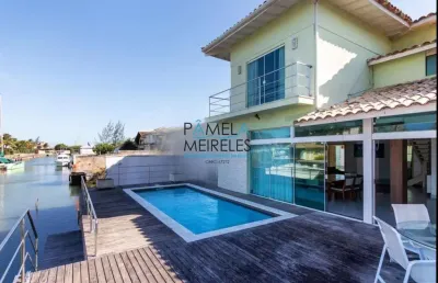 Linda casa 4 quartos beira do canal da marina de búzios
