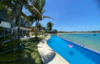 Casa mansão 6 suítes pé na areia - praia da ferradura - armação de búzios.