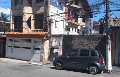 Sobrado para venda em centro de 140.00m² com 3 quartos, 1 suite e 2 garagens