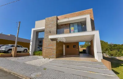 Sobrado para venda em roça grande de 199.00m² com 3 quartos, 1 suite e 2 garagens