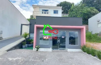 Casa para venda em centro de 346.00m² com 2 quartos, 1 suite e 3 garagens