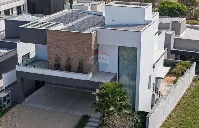 Casa de condomínio para venda em alphaville nova esplanada 4 de 377.43m² com 3 quartos e 3 suites