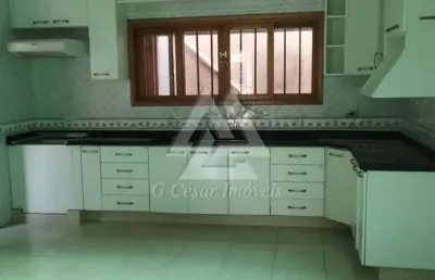 Sobrado para venda em centro de 321.00m² com 2 quartos, 2 suites e 2 garagens