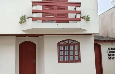 Sobrado para venda em matinhos de 62.00m² com 2 quartos e 2 garagens