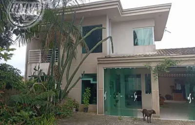 Sobrado para venda em guaratuba de 140.00m² com 4 quartos, 2 suites e 3 garagens