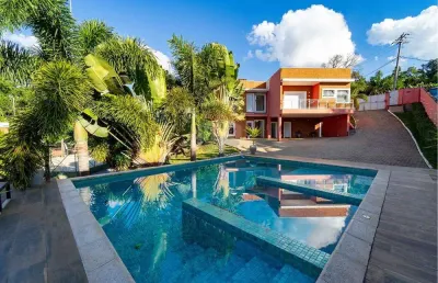 Casa para venda em jardim tarantela de 1000.00m² com 7 quartos, 7 suites e 8 garagens