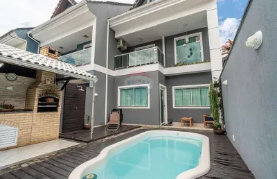 Casa de condomínio para venda em taquara de 136.00m² com 3 quartos, 1 suite e 1 garagem