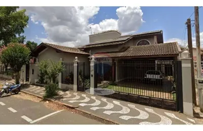 Casa para venda em centro de 339.00m² com 4 quartos, 4 suites e 4 garagens