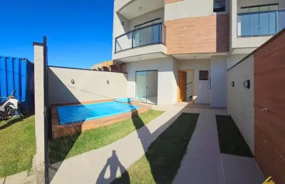 Sobrado para venda em guaratuba de 121.00m² com 3 quartos, 2 suites e 2 garagens