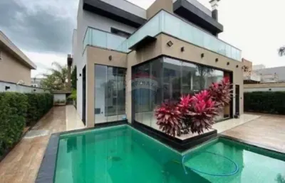 Casa de condomínio para alugar em residencial e empresarial alphaville de 380.00m² com 5 quartos, 5 suites e 4 garagens