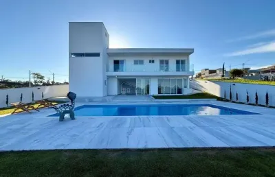 Casa para venda em cercado de 818.87m² com 4 quartos, 3 suites e 4 garagens