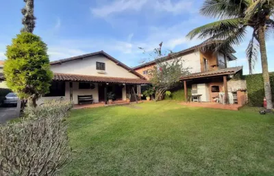 Casa na praia grande, 650m² de terreno, a.u 280m² localização a 300m da praia