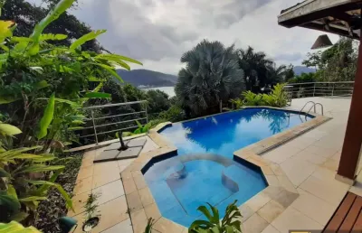 Excelente casa, 600m² de área construída, 6 suítes em condomínio - toninhas-ubatuba