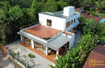 Excelente casa mobiliada com 4 suítes no bairro itamambuca em ubatuba.