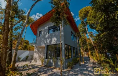 Excelente casa mobiliada com 4 suítes no bairro prumirim em ubatuba.