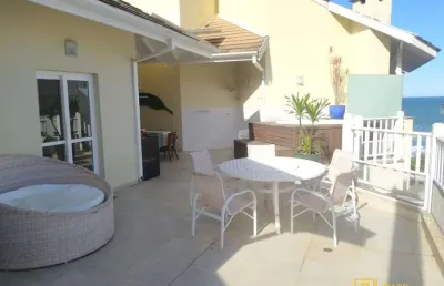 Linda cobertura 4 suítes na praia grande - condomínio frente mar