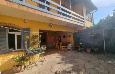 Casa em condomínio fechado com 4 quartos à venda na rua bernardino caetano fraga, 511, medianeira, porto alegre por r$ 660.000