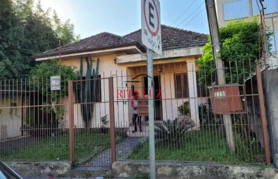 Casa com 3 quartos à venda na rua general gomes carneiro, 316, medianeira, porto alegre por r$ 550.000