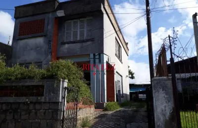 Casa com 3 quartos à venda na rua caldre e fião, 524, santo antônio, porto alegre por r$ 580.000