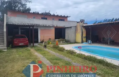 Seu refúgio dos sonhos: casa de 2 pisos com 4 dormitórios, 3 suítes e piscina a apenas 100m do mar em cidreira!
