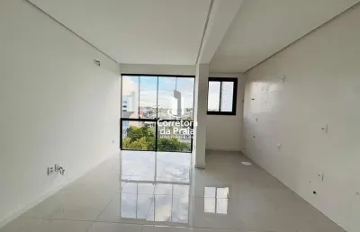 Apartamento para venda em tramandaí, centro, 2 dormitórios, 1 suíte, 2 banheiros, 1 vaga
