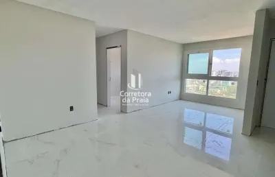 Apartamento para venda em tramandaí, centro, 2 dormitórios, 1 suíte, 2 banheiros, 1 vaga
