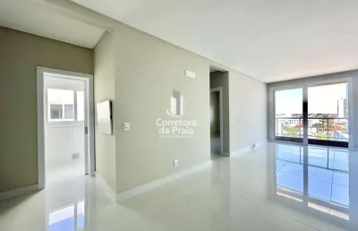 Apartamento para venda em tramandaí, centro, 2 dormitórios, 1 suíte, 2 banheiros, 1 vaga