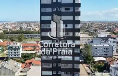 Apartamento para venda em tramandaí, centro, 2 dormitórios, 1 suíte, 2 banheiros, 2 vagas