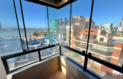 Apartamento para venda em tramandaí, centro, 2 dormitórios, 1 suíte, 2 banheiros, 1 vaga