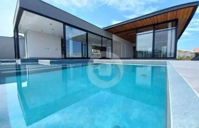 Casa com 4 dormitórios à venda, 600 m² por r$ 6.450.000,00 - condomínio reserva do paratehy - são josé dos campos/sp